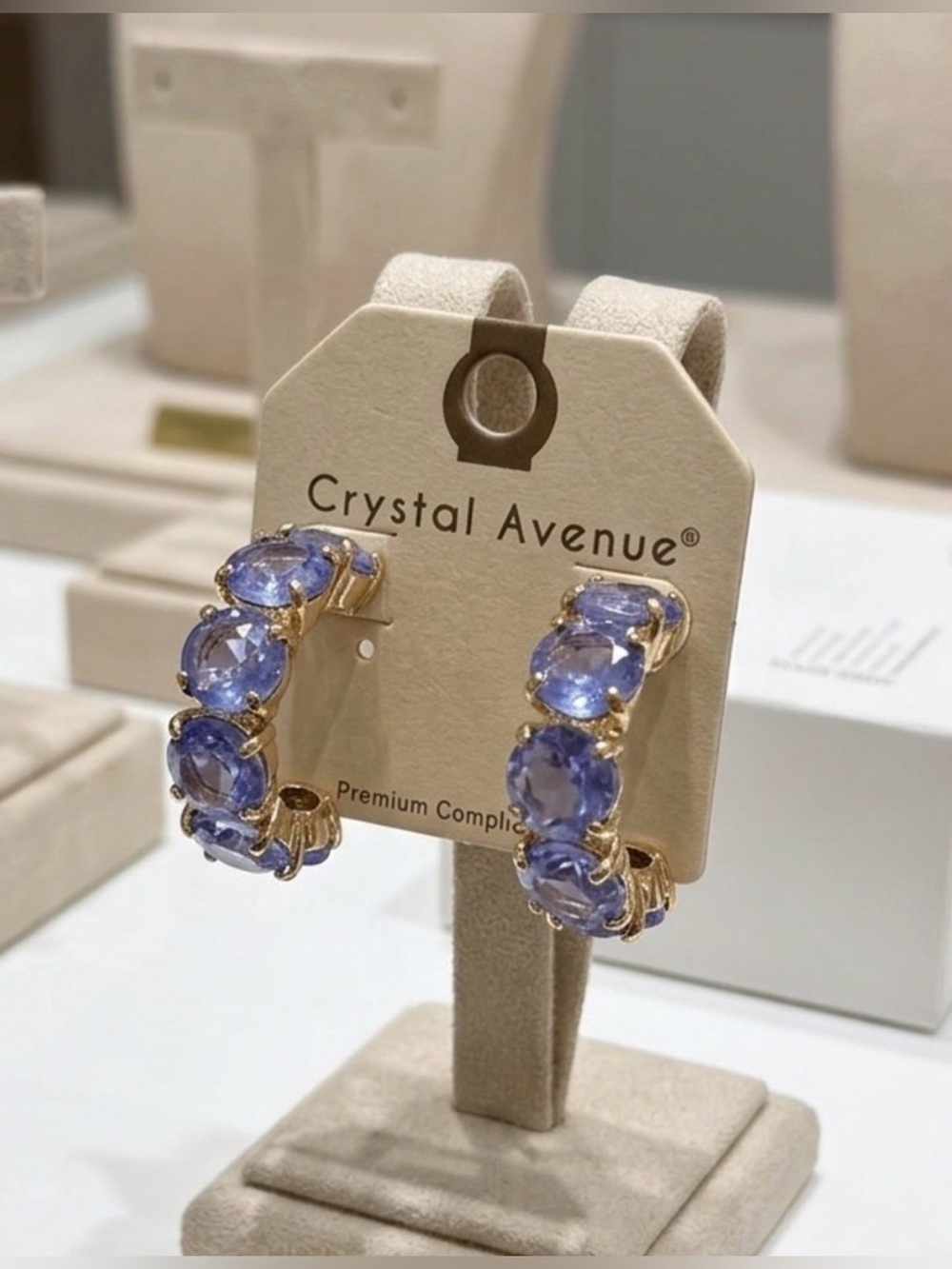 Crystal Avenue Gold Hoop Earrings with Lavender Blue Stones